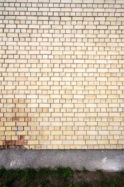 Gelbe Backsteinmauer Hintergrund — Stockfoto