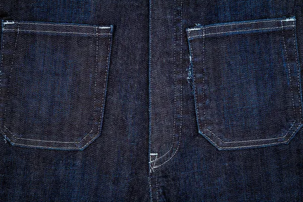 深蓝色牛仔裤面料与侧口袋背景 牛仔裤的细节 蓝色牛仔裤纹理背景 — 图库照片