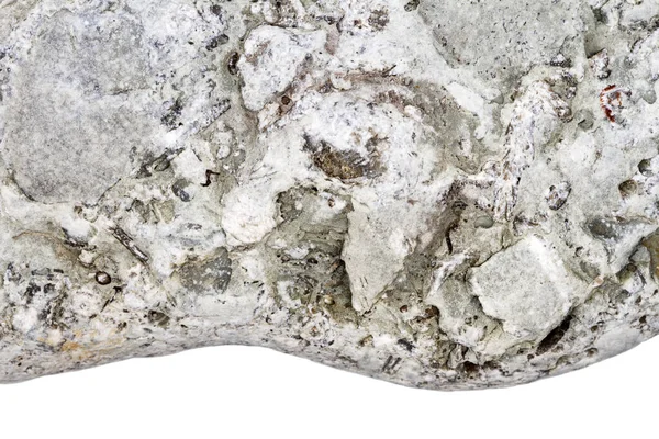 白地に孤立した灰色の石の一部 — ストック写真