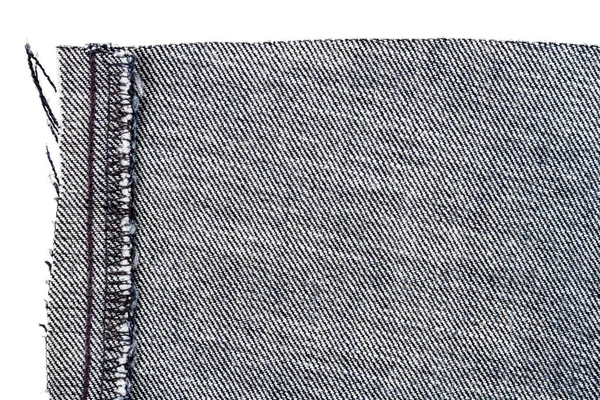 Kousek Černé Džíny Tkaniny Izolované Bílém Pozadí Hrubé Nerovné Okraje — Stock fotografie