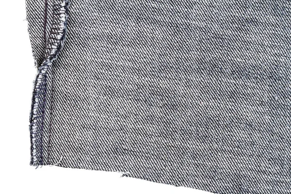 Kawałek Tkaniny Czarnych Dżinsów Białym Tle Twarde Nierówne Krawędzie Tył — Zdjęcie stockowe