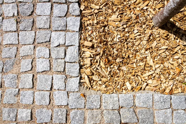 Gray Granite Blocks Wood Chips Tree Trunk —  Fotos de Stock