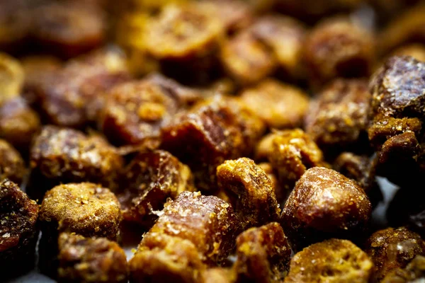 Extreme close up of bee bread. Selective focus. Shallow depth of field