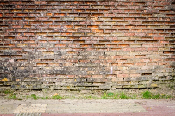 Lama Cuaca Dinding Batu Bata Dan Trotoar — Stok Foto