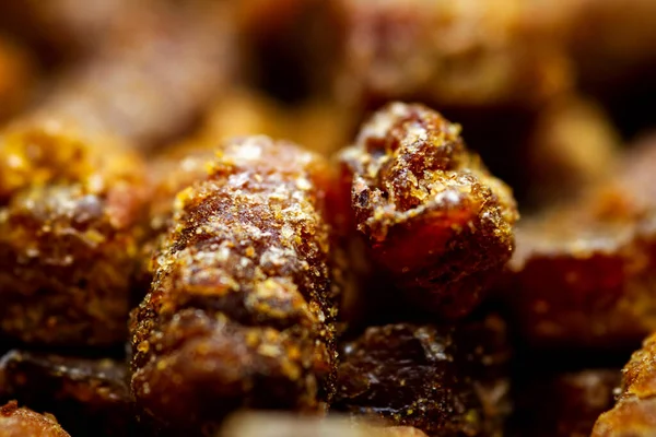 Extreme close up of bee bread. Selective focus. Shallow depth of field