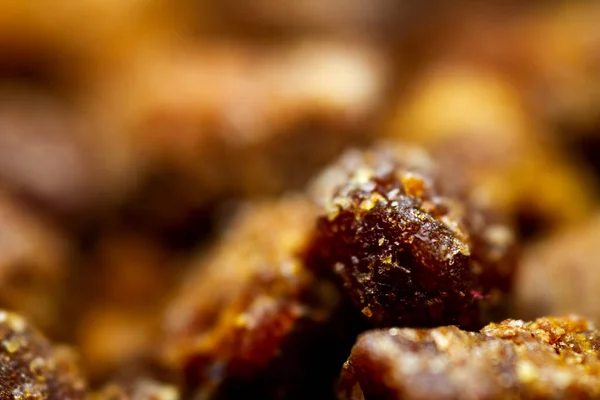 Extreme close up of bee bread. Selective focus. Shallow depth of field