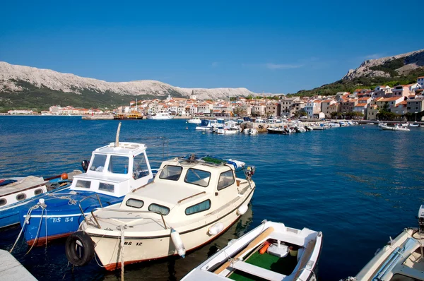 Boats on port at Baska background Baska old town - Krk - Croatia — Stock Photo, Image