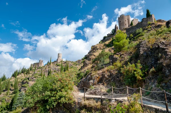 Walking path and Towers Quertinheux Cabaret and La Tour Regine Stockbild