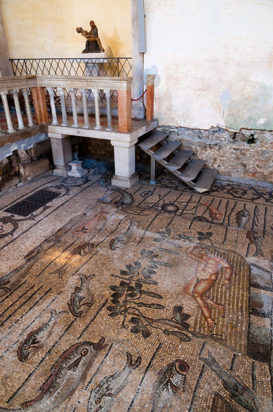 Mosaics and Mary statue inside Basilica di Aquileia