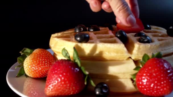 Close Hand Pastry Chef Places Blueberries Raspberries Freshly Baked Waffles — Stock Video