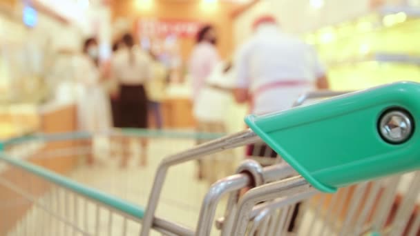 New Normal Concept Close Handle Shopping Cart Supermarket Blur People — Vídeo de Stock