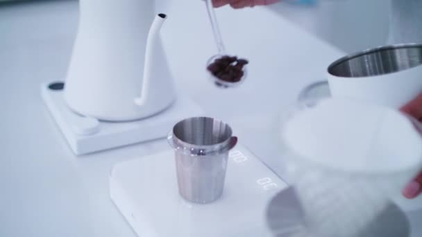 Close Barista Hand Scooping Coffee Beans Pouring Them Measuring Cup — Stok Video