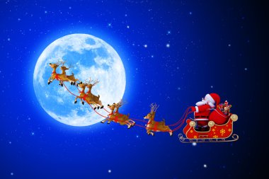 Noel Baba ve onun kızak moon ile mavi arka plan üzerinde