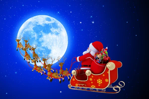 Père Noël et son traîneau avec lune sur fond bleu — Photo