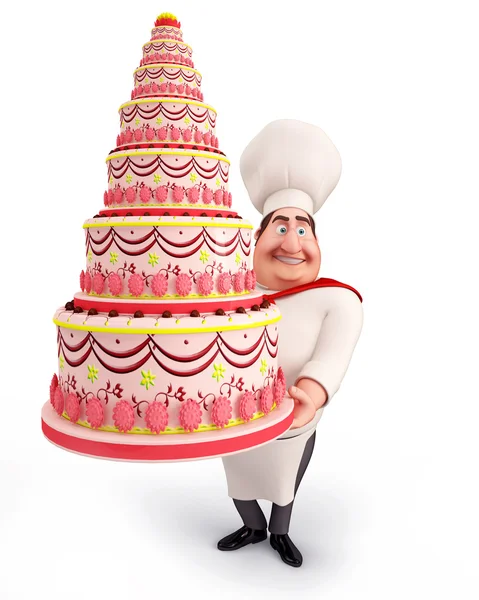 Chef décorant un gros gâteau — Photo