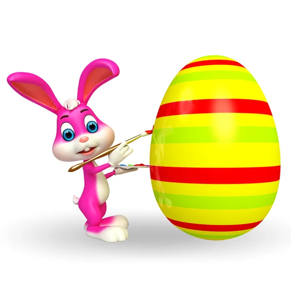 Пасхальный кролик с большим цветным яйцом — стоковое фото