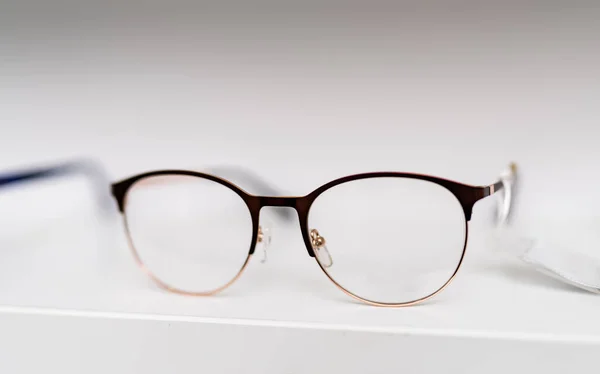 Modern eyeglasses macro detail. Optical object with modern design.