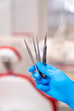 Hospital sterial steel instruments. Dentistry professional equipment close up view.