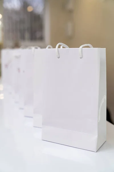 Light Paper Shopping Bags Gift White Packets Standing — Φωτογραφία Αρχείου