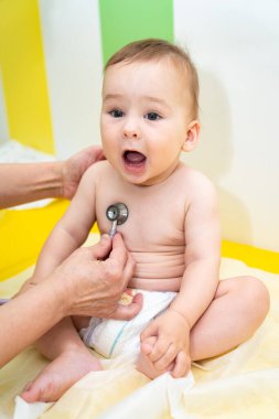 Pediatric babe healthcare. Professional physician kid diagnostic.