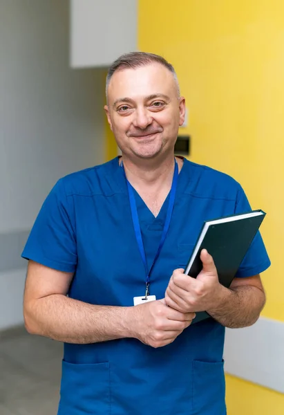 Confident Young Male Specialist Doctor Badge Hospital Hall — Stock Fotó