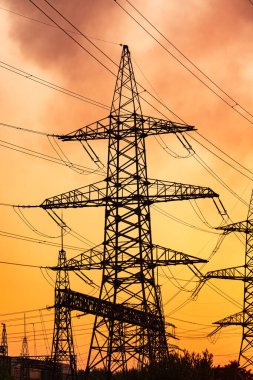 Power energy distribution. Electricity high voltage silhouette towers.