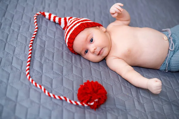 Cute Adorable Baby Lying Funny Red Hat Little Newborn Boy — Stock Photo, Image