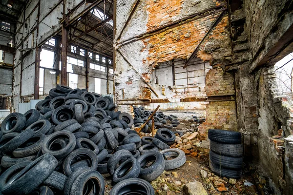 Landfill with old tires and tyres for recycling. Disposal of waste tires.