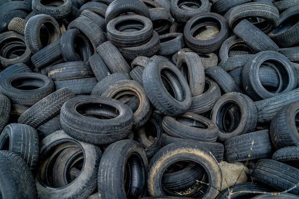 Worn out tires for recycling. Tyre trash burning plant.