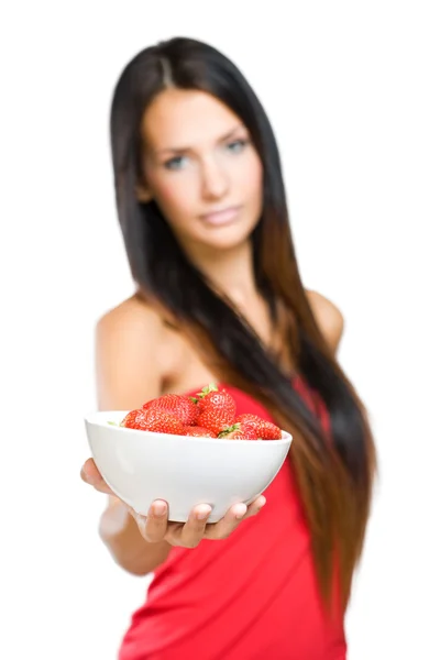 Young beauty offering strawberries. — Stock Photo, Image