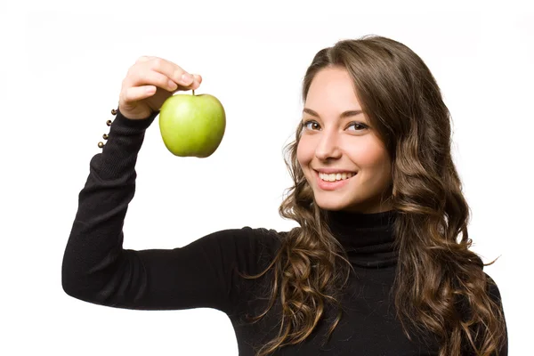 Fit mladá brunetka s zelené jablko. — Stock fotografie