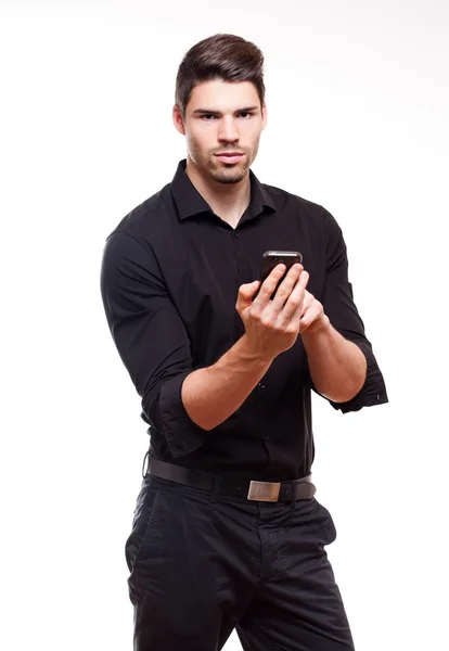 Jovem empresário usando smartphone. — Fotografia de Stock