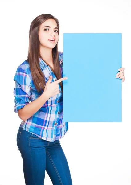Cute brunette holding sign. — Stock Photo, Image