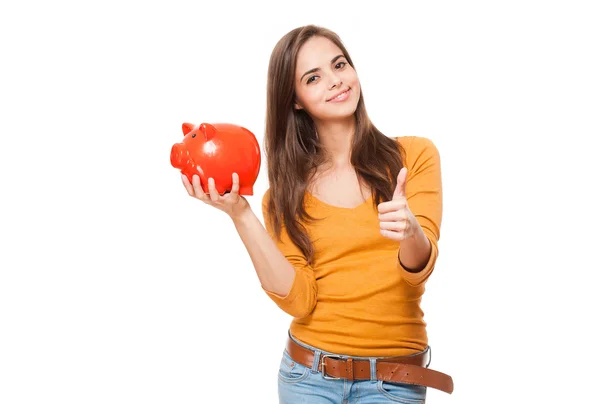 Cute brunette with piggy bank. — Stock Photo, Image