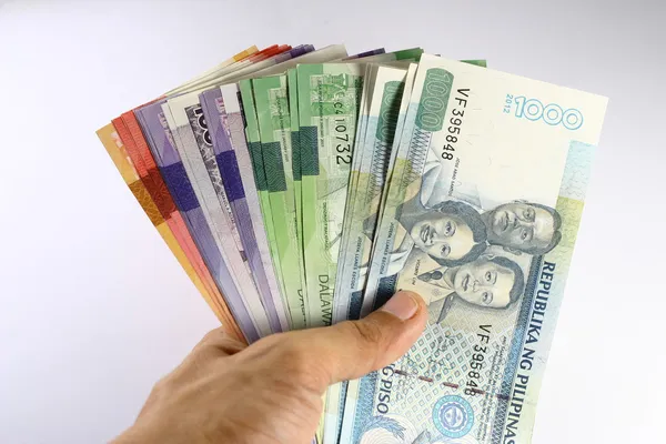 Philippine Peso Bills Held in Hand — Stock Photo, Image