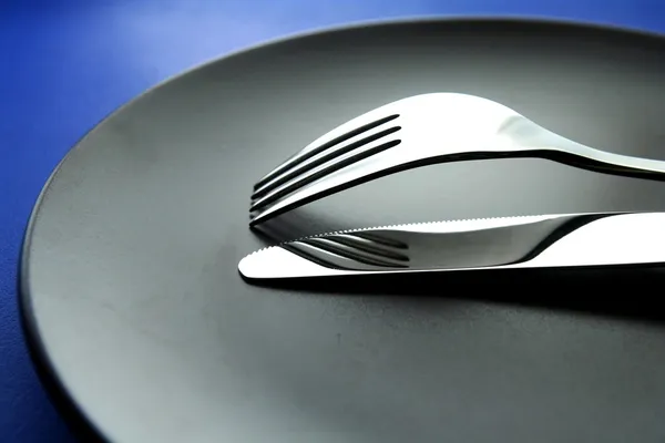 Fork, knife and plate — Stock Photo, Image