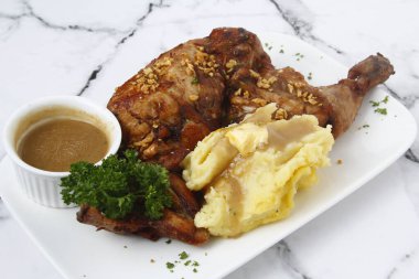 Photo of freshly cooked fried chicken with mashed potato