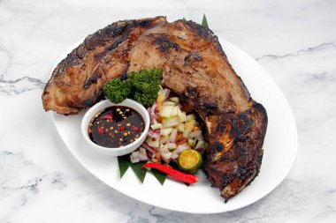 Photo of freshly cooked grilled Tuna Panga or grilled tuna jaw.