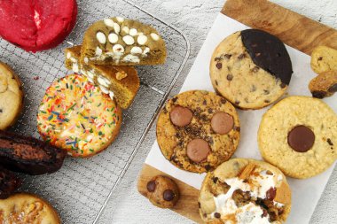 Photo of freshly baked assorted flavored soft cookies.