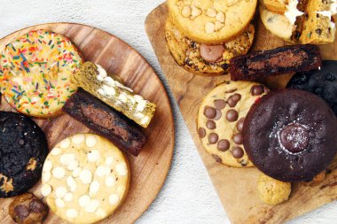 Photo of freshly baked assorted flavored soft cookies.