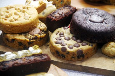 Photo of freshly baked assorted flavored soft cookies.