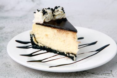 Photo of a slice of freshly made chocolate marble cake.