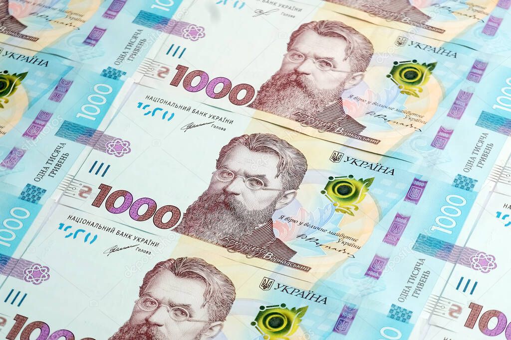 Side view banknotes of 1000 UAH Ukrainian Hryvnia, the national currency of Ukraine. 