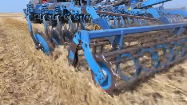 Close Rotary Cultivator Disc Plow Tractor While Working Field Removing — Stockvideo