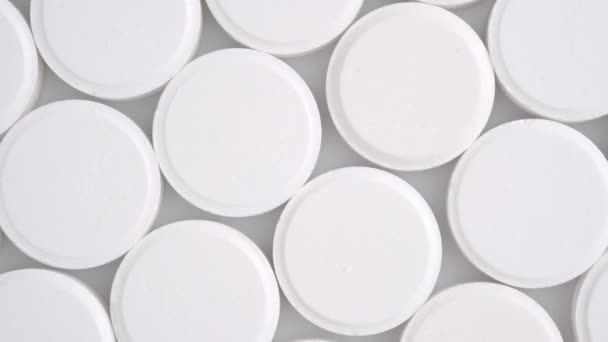 Many White Medical Pills Rotating Close Top View Pharmaceutical Industry — Vídeo de stock