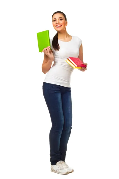 Jovem segurando livros — Fotografia de Stock