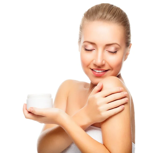 Mooie blonde vrouw inschrijving pot Moisturizer crème — Stockfoto