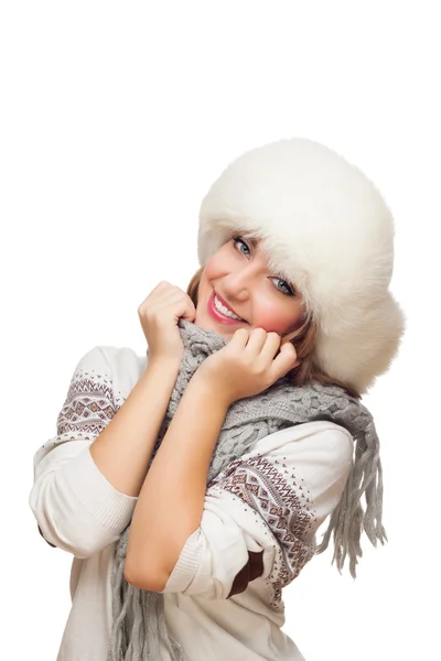 Young woman in cap covers face with scarf — Stock Photo, Image