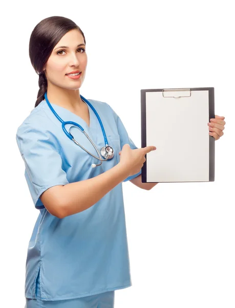 Young woman in medical suit stand with folder — Stock Photo, Image