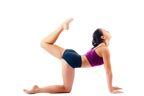 Girl doing gymnastics on white background — Stock Photo, Image